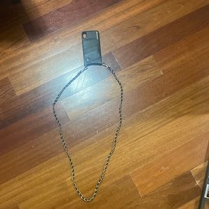 bandolier cross body phone case. Original price $249. gold.good condition